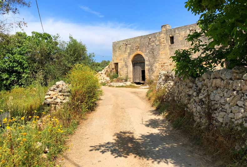 A stone building on a quiet back road in Puglia