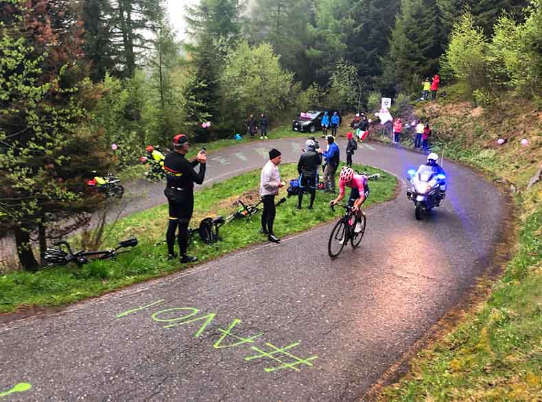 A pro cyclists racing the Giro d'Italia on the Mortirolo