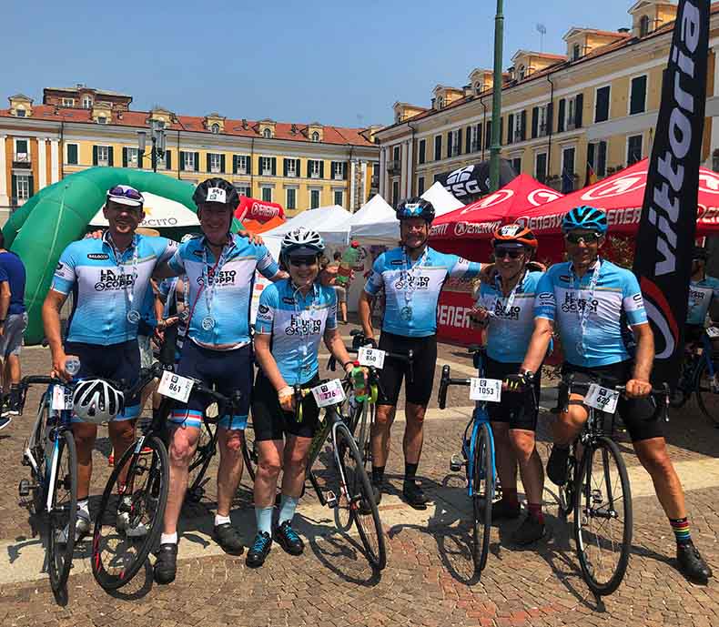 a group of riders at the end of the La Fausto Coppi Gran fondo
