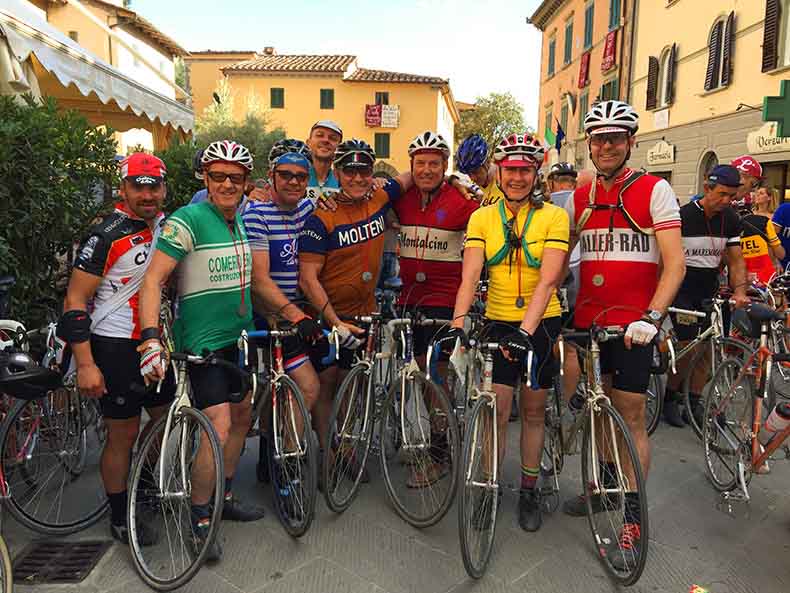 A group of cyclist that have finished the L'eroica ride in Tuscany