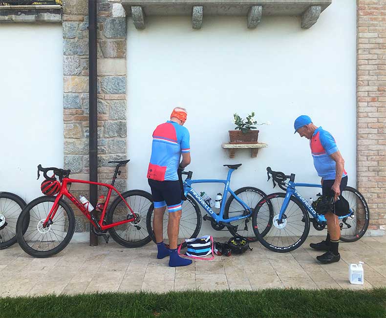 two cyclists getting ready to start their ride along Prosecco road