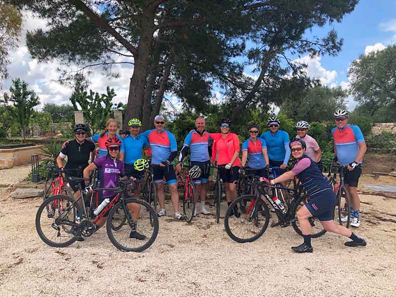 A group of cyclists on a cycling holiday in Puglia, Italy