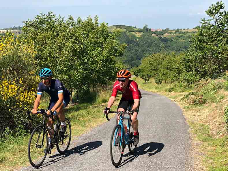 Two cyclists riding in Piemonte