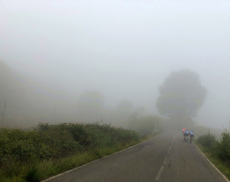 Riding into the fog in Tuscany
