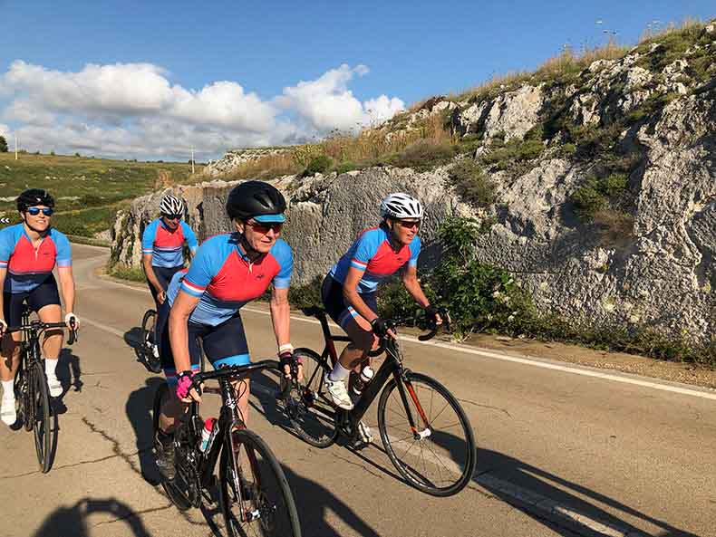 Four riders on a cycling holiday in Puglia