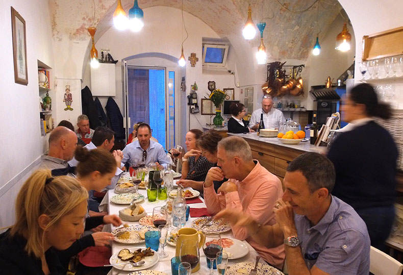 A group dinner in a small trattoria in Puglia