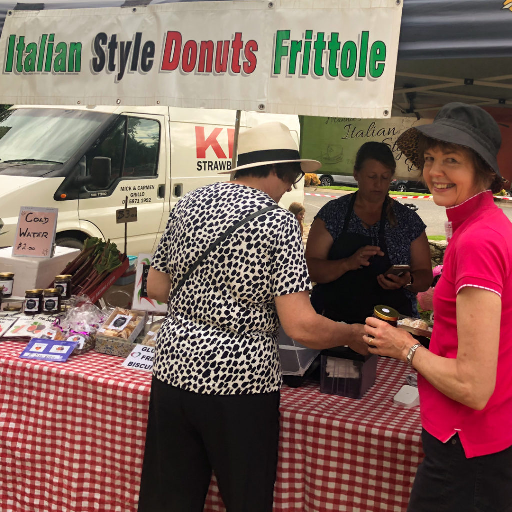 two women at a victorian farmers market