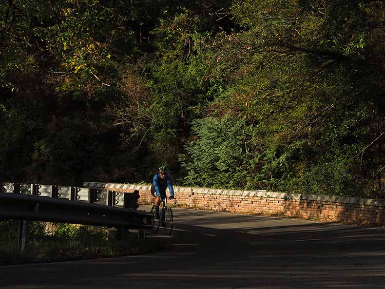 a cycling riding in Tusany