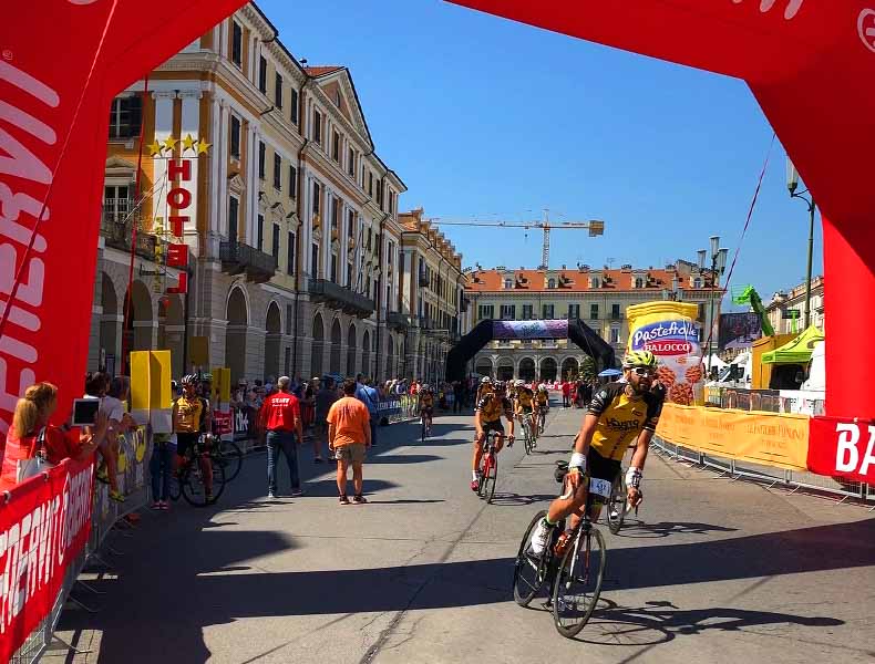 A rider going over the finish line at La Fausto Coppi Gran Fondo