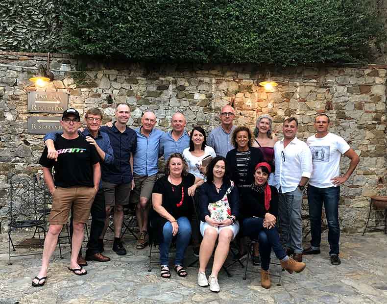 A group of people after a wine tasting in Tuscany