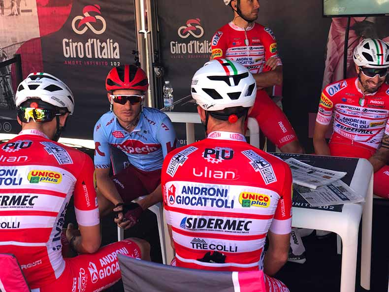 Professional Bike riders at the Giro having coffee