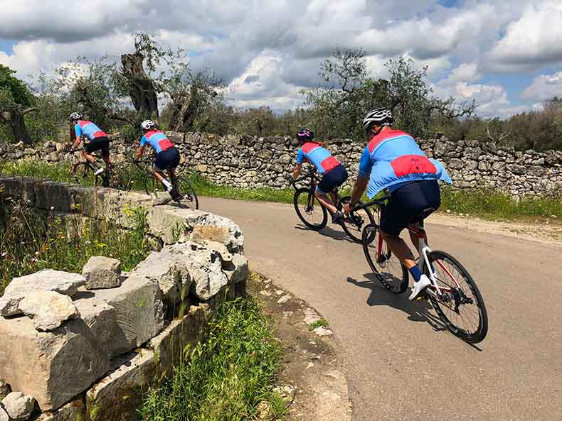 Cycling riding on the small quiet rock lined back roads of Puglia