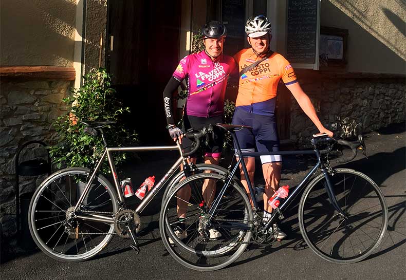 two cyclists and their bikes