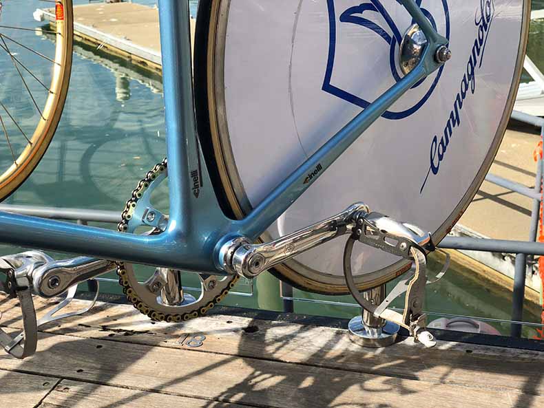 A close up of a Cinelli bicycle with a disc wheel