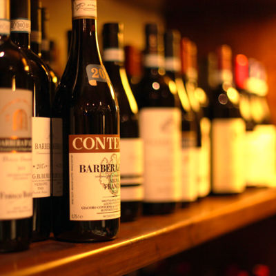 A shelf full of wine from Piemonte