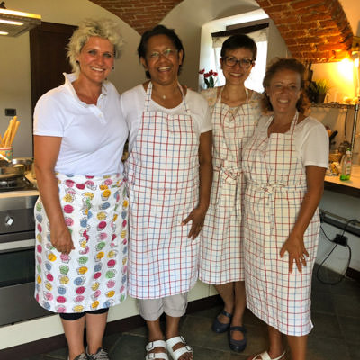 non riding partners at a cooking class in Piemonte