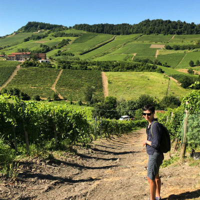 Non riding partners hiking through the vineyards in Piemonte