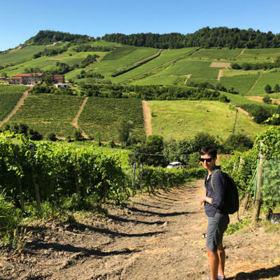 A non riding partner hiking in the Le langhe vineyards