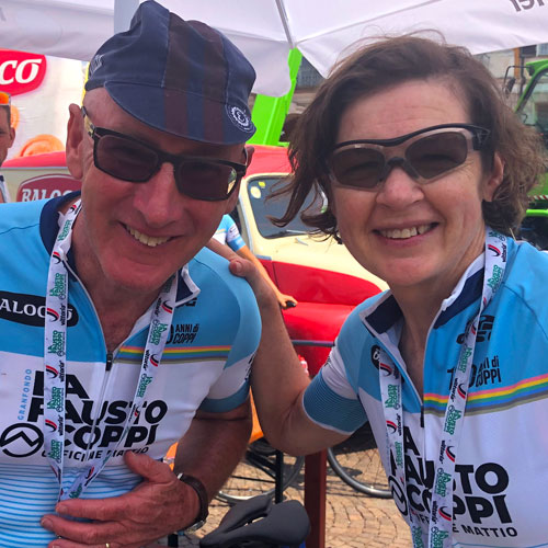 Two people at the finishing line of La Fausto Coppi Gran Fondo