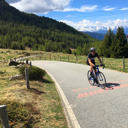 A man cycling up Passo Mortirolo