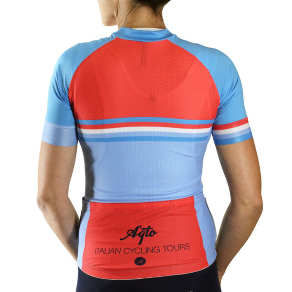 the back of a woman in a cycling jersey