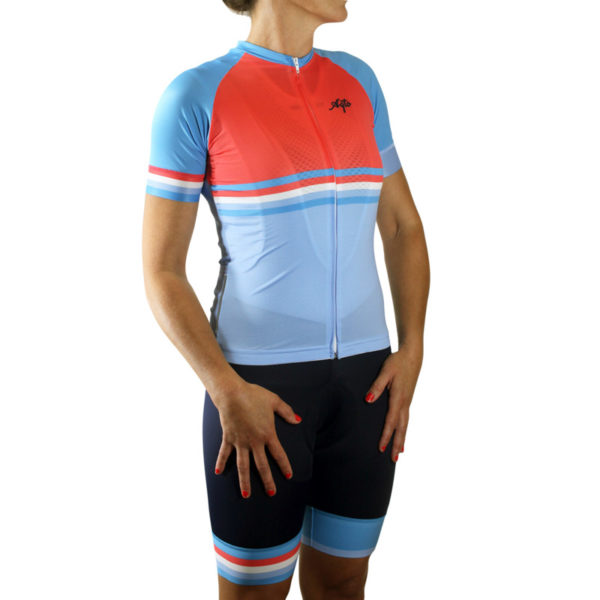 a woman wearing cycling jersey and shorts